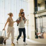 family traveling after scheduling a dental visit before summer vacation