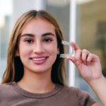 teen with invisalign clear aligners for braces